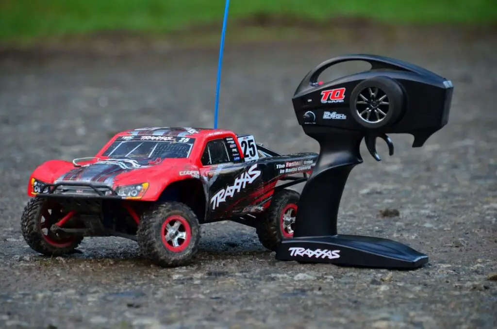 A Traxxas Slash with its controller/Transmitter.