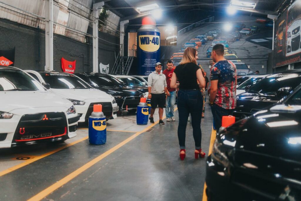 Parked Mitsubishi Cars Inside a Garage with WD-40 cans.